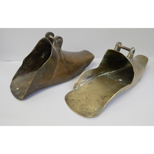 767 - Two brass Spanish Conquistador stirrups