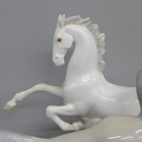 608 - A large Lladro figure group, two Galloping Horses, 37cm