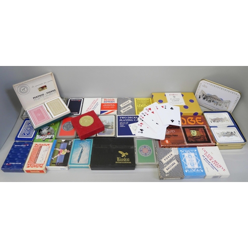 773 - A collection of playing cards, over 25 sets