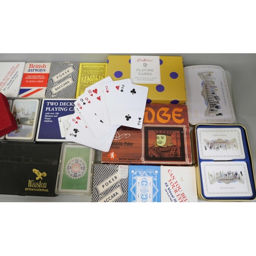 773 - A collection of playing cards, over 25 sets