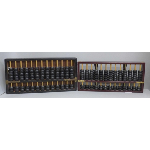 619 - Two vintage Taiwanese abacus