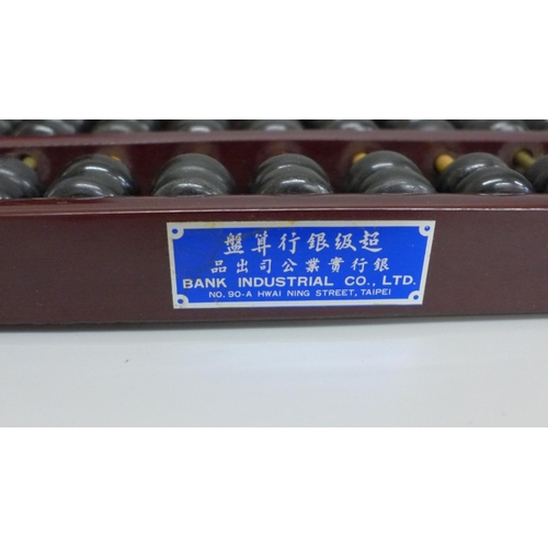 619 - Two vintage Taiwanese abacus