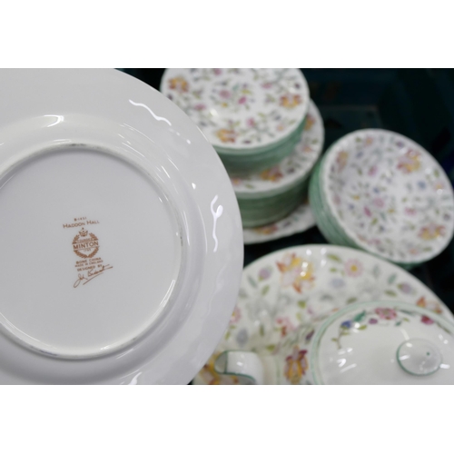 795 - A Minton Haddon Hall dinner and tea service including twelve dinner, tea and side plates, some piece... 