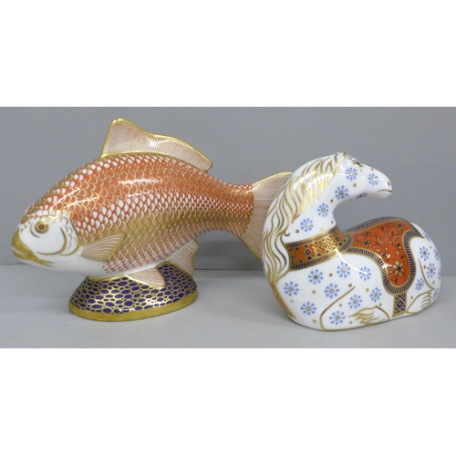 627 - Two Royal Crown Derby paperweights, Golden carp and laying horse with gold stopper