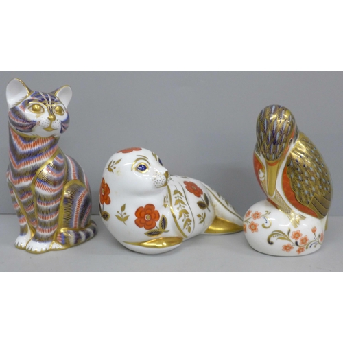 628 - Three Royal Crown Derby paperweights, kingfisher, seal pup and cat