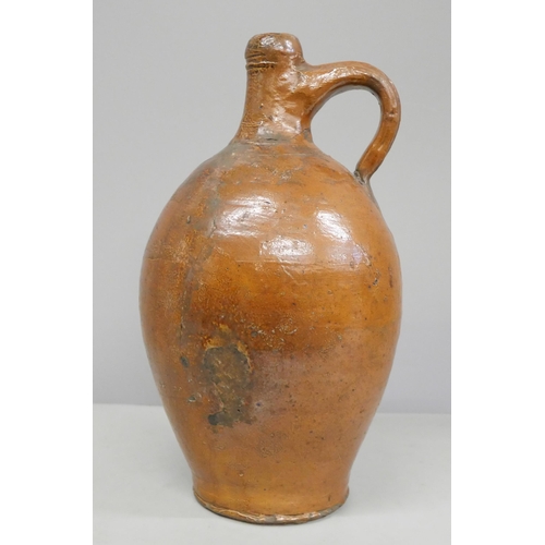 813 - An earthenware salt glaze flagon, neck broken and restored