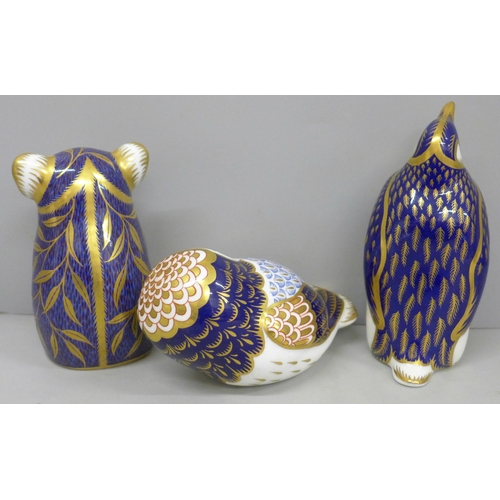 638 - Three Royal Crown Derby paperweights, owl, koala and penguin, two gold and one silver stopper