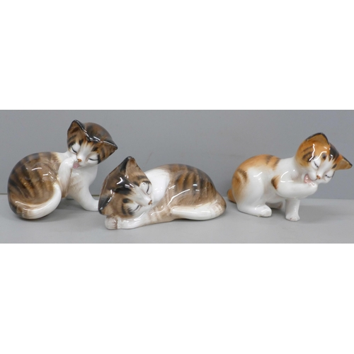 643 - Three Royal Doulton cat figures