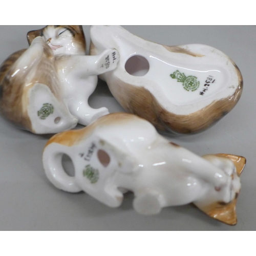 643 - Three Royal Doulton cat figures