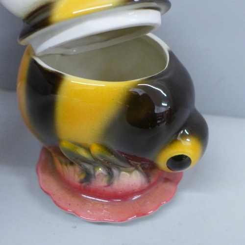 654 - A Goebel West German honey pot in the form of a bee, crazed