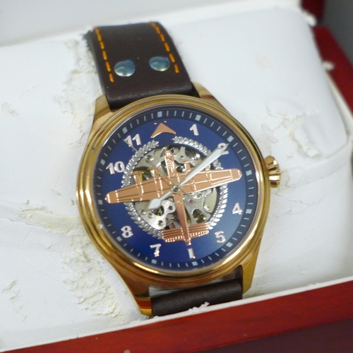 659 - Two boxed wristwatches, Royal Navy Fleet Air Arm and one other with bomber motif and skeleton dial