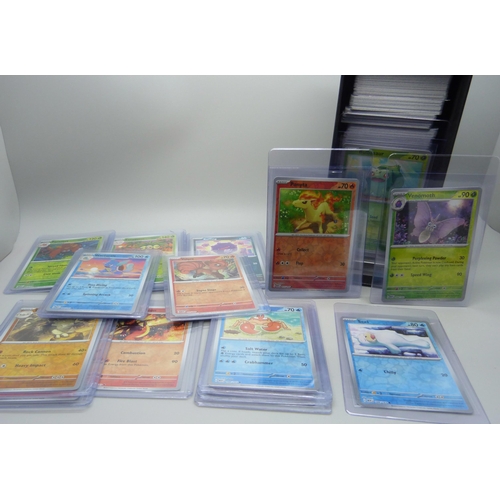 848 - A collection of 550+ 151 Scarlet and Voilet Pokémon cards including Holographic in top loaders prote... 