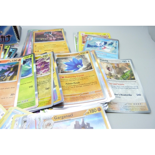 849 - A collection of 100+ Black Star Rare Pokémon cards, Holographic and reverse Holographic