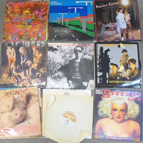 673 - A box of rock and pop LP records, including Cream, Traffic, Santana, Bob Dylan, Thompson Twins, Van ... 