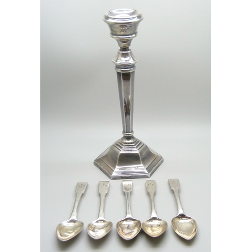 858 - Five Georgian silver teaspoons, 83g, and a silver candlestick