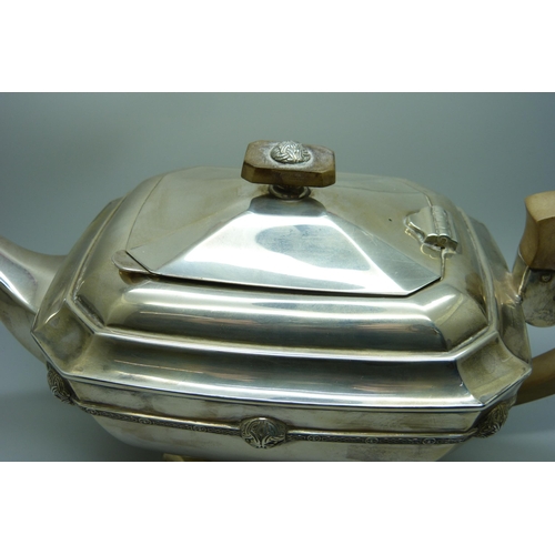 860 - A silver teapot and a silver spoon, 835g