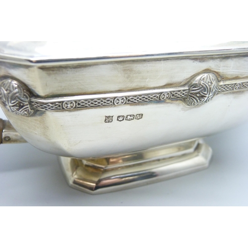 860 - A silver teapot and a silver spoon, 835g