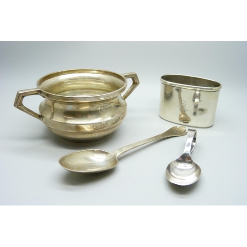 863 - A silver bowl, a silver flask cup and two silver spoons, 238g