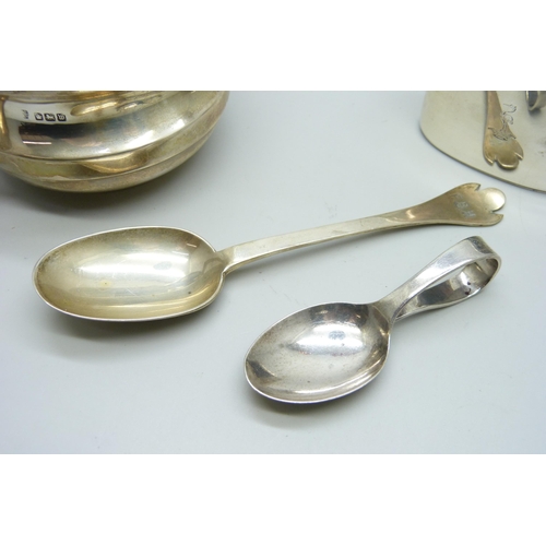 863 - A silver bowl, a silver flask cup and two silver spoons, 238g