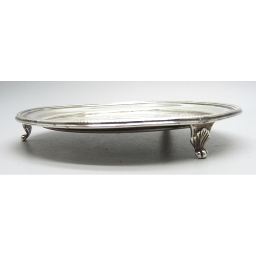 871 - A late Victorian three piece silver condiment set and a Victorian silver tray, 324g, tray 147mm