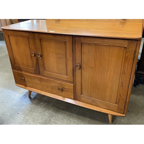 65 - An Ercol Golden Dawn elm sideboard