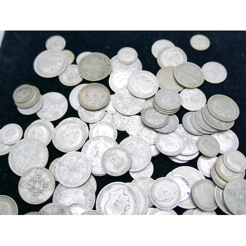 878 - A collection of half silver coins, 698g