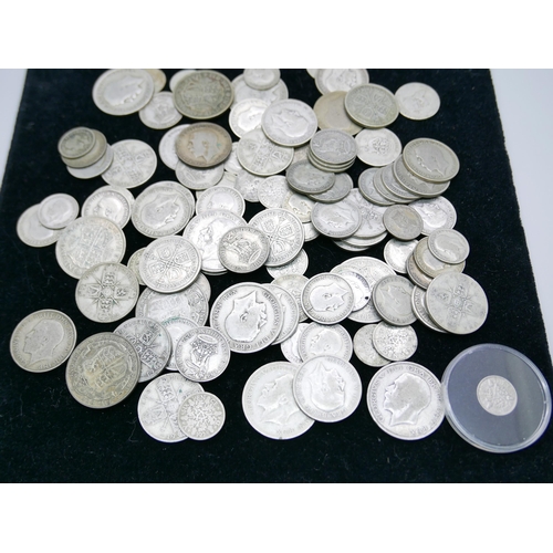 878 - A collection of half silver coins, 698g