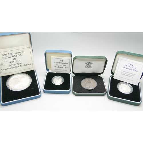 880 - Four Royal Mint silver coins; including National Trust and Battle of Britain commemorative, all boxe... 