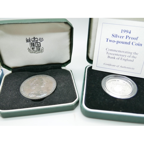 880 - Four Royal Mint silver coins; including National Trust and Battle of Britain commemorative, all boxe... 