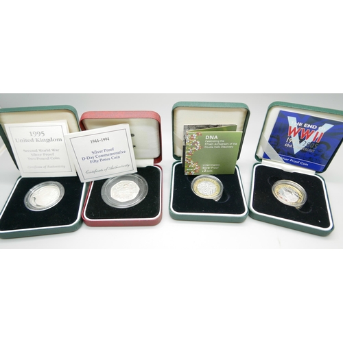 884 - Four silver proof coins including WWII 60th Anniversary and DNA Double Helix Discovery, with certifi... 