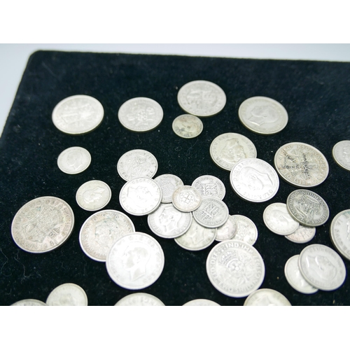 893 - A collection of half silver coins, 279g