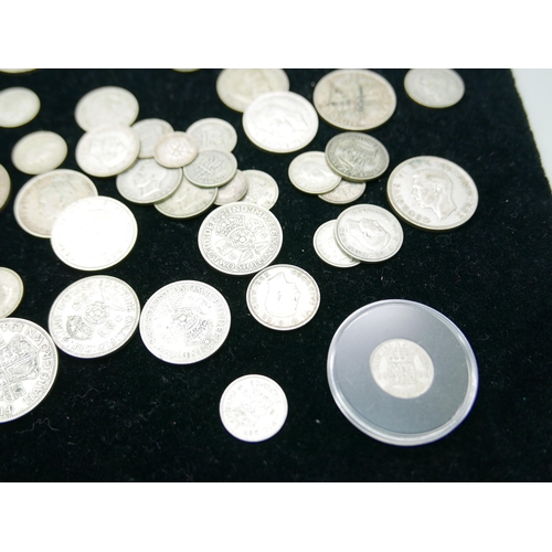 893 - A collection of half silver coins, 279g