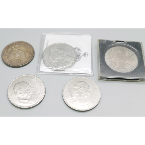 896 - An 1889 US silver dollar and four commemorative crowns