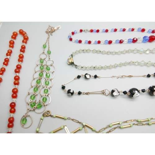 899 - Twelve vintage necklets