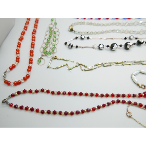 899 - Twelve vintage necklets