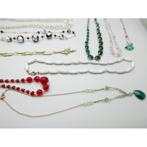 899 - Twelve vintage necklets