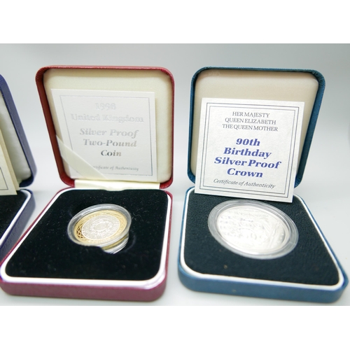 900 - Four cased silver proof coins including Queen Elizabeth The Queen Mother 90th Birthday silver proof ... 