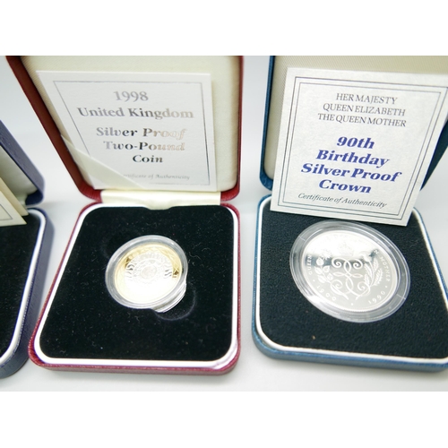 900 - Four cased silver proof coins including Queen Elizabeth The Queen Mother 90th Birthday silver proof ... 