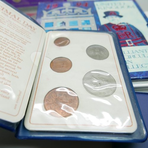 901 - A collection of coin sets including UK 1994, The Official UK Royal Wedding coin 2011 and Britains Fi... 