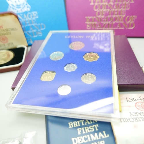 908 - A collection of five coin sets, a Britains First Decimal Coins pack and two proof crowns