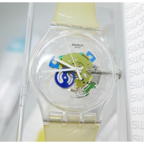 911 - Four Swatch wristwatches, boxed