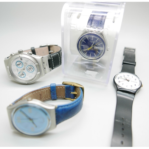 912 - Four Swatch wristwatches, one boxed