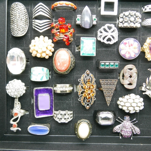 923 - A collection of 46 costume rings in presentation box