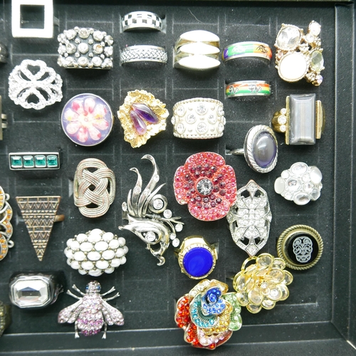 923 - A collection of 46 costume rings in presentation box