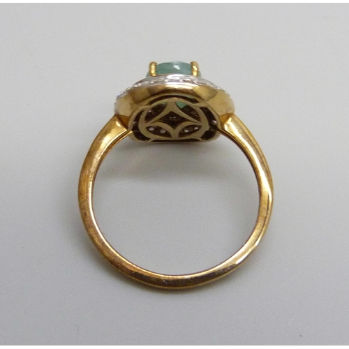 930 - A 9ct gold, diamond and green stone ring, 2.8g, M