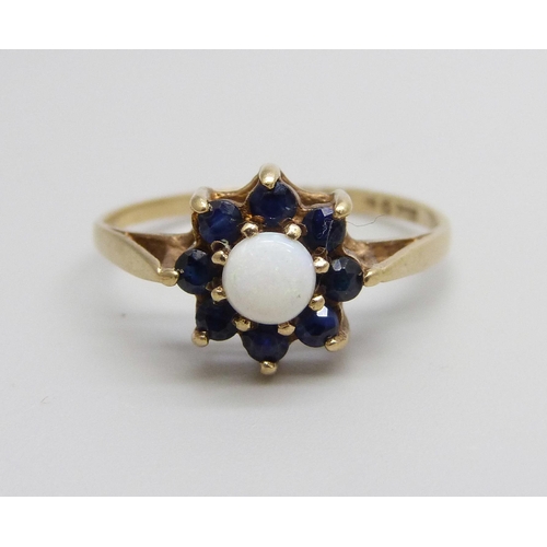 933 - A 9ct gold, sapphire and opal ring, 1.6g, P