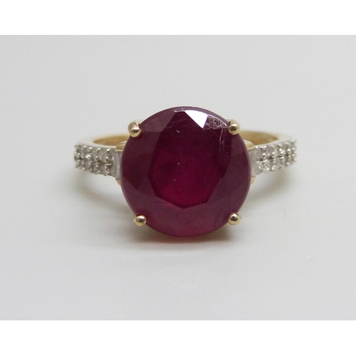 939 - A 9ct gold, diamond and synthetic ruby ring, 3.1g, K