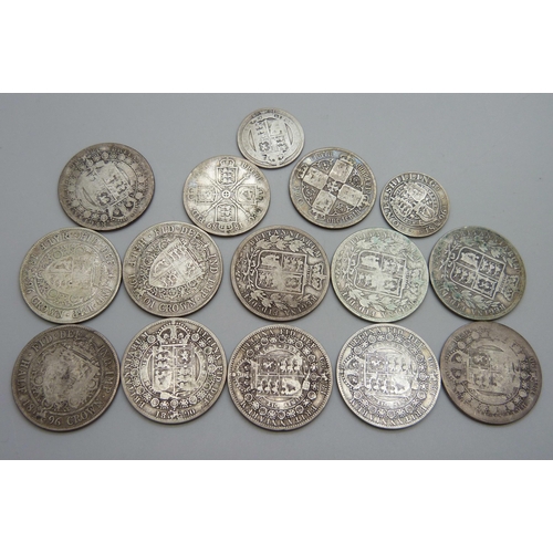 943 - A collection of fifteen Victorian silver coins, 11 half-crowns, 2 florins and 2 one shilling, 181.5g