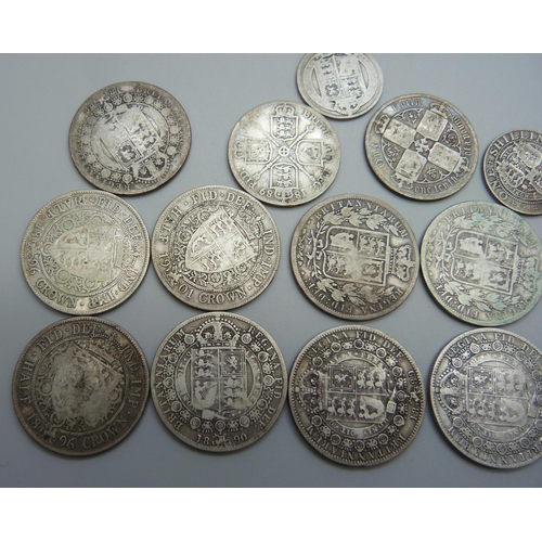 943 - A collection of fifteen Victorian silver coins, 11 half-crowns, 2 florins and 2 one shilling, 181.5g