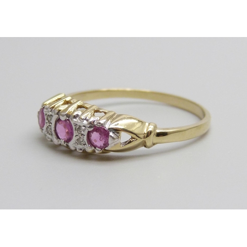 952 - A 9ct gold, ruby and diamond ring, 1.9g, S